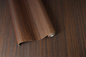 Our "Dark Eyed Wall" sisal wallpaper in a deep brown color adds warmth and comfort to your room. Made with care and attention to detail, this textured wallpaper brings a cozy, natural feel to your space. The rich brown shades create a relaxing, welcoming vibe that works well in any room, offering a simple and eco-friendly design that fits perfectly with your home’s style.